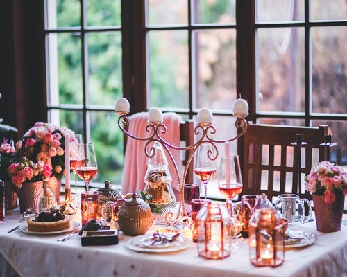 A warm, softly lit room prepared for evening reading