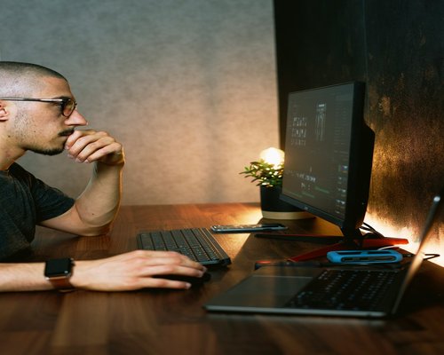 A person taking a short break from looking at their computer screen